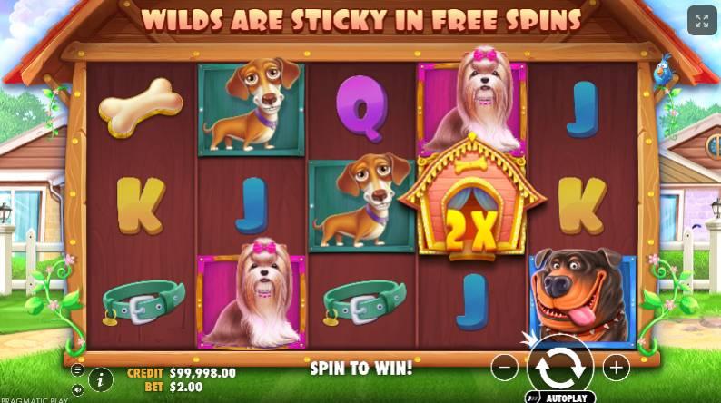 The Dog House slot gameplay featuring sticky wilds and dog-themed symbols on the reels