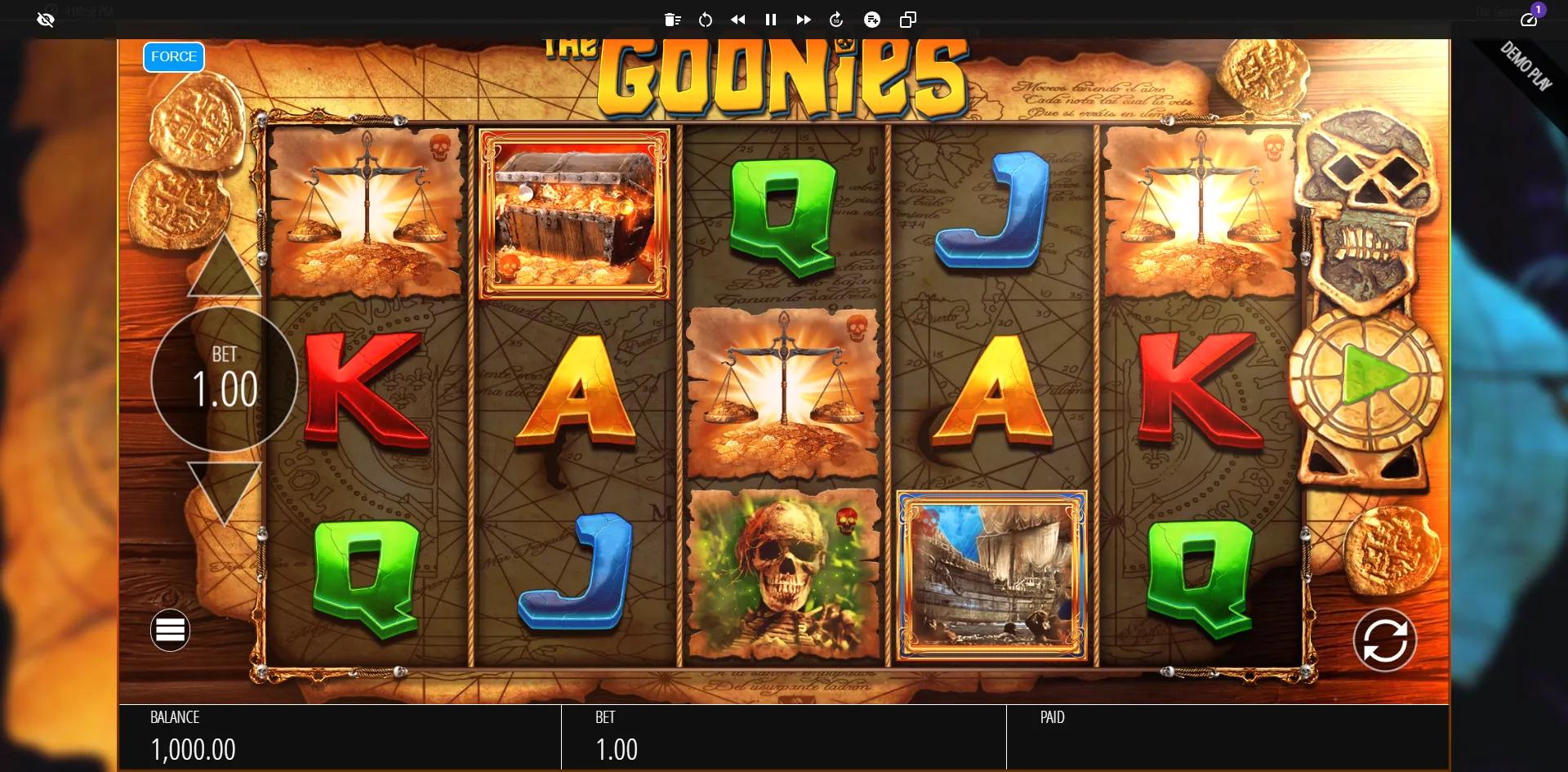 The Goonies slot gameplay showing pirate-themed reels with Wild medallion, Never Say Die flag and treasure symbols