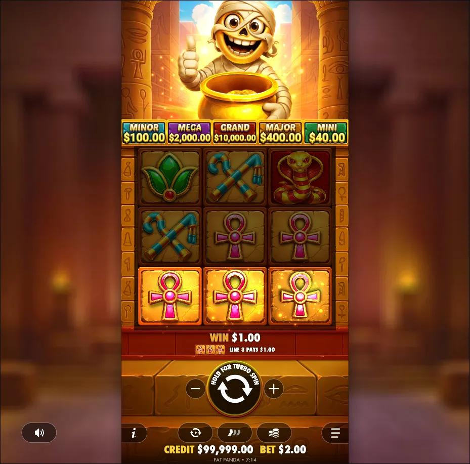 Tut's Treasure Tower gameplay showing 3x3 grid with Egyptian symbols, 5 jackpots, and expanding tower mechanic