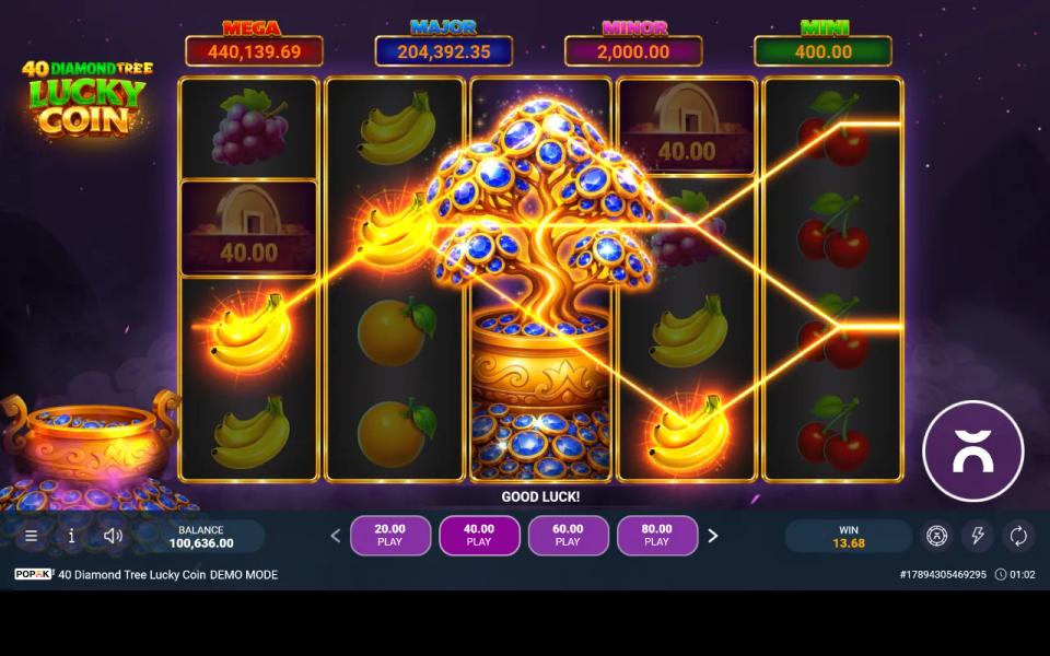 The Diamond Tree wild expanded across the whole middle reel of 40 Diamond Tree Lucky Coin with paylines lit in gold