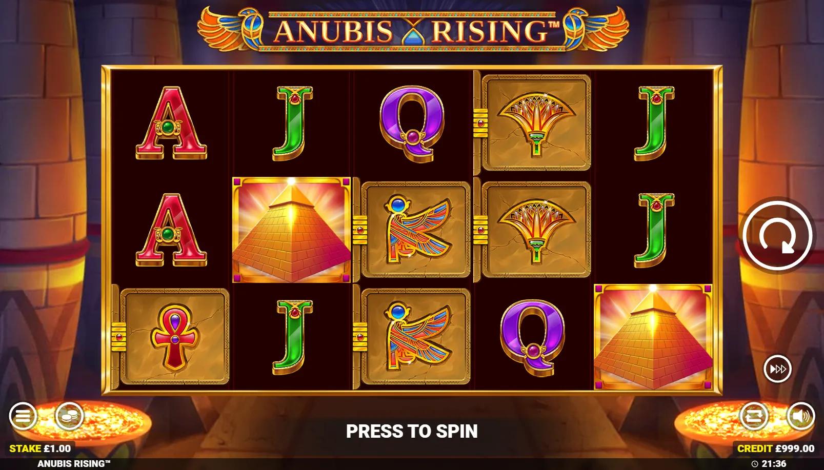 Anubis Rising slot showing 5x3 Egyptian grid with Anubis and Pharaoh expanding Wilds