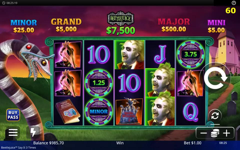 Beetlejuice Say It 3 Times base game on a 5x3 grid, with three prize coins on the reels, one of them carrying the Minor jackpot badge, three stacked Beetlejuice wilds on the fourth reel, and the five jackpot meters running across the top