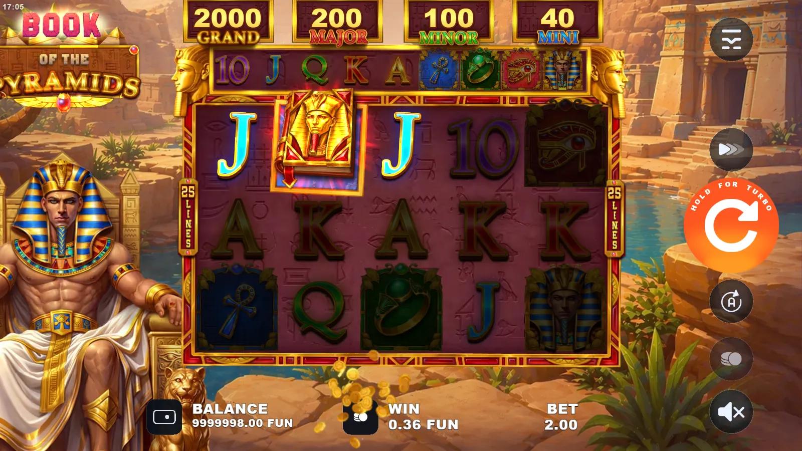 Book of the Pyramids slot gameplay showing 5x3 Egyptian grid with Pharaoh, Book and card symbols under four jackpots