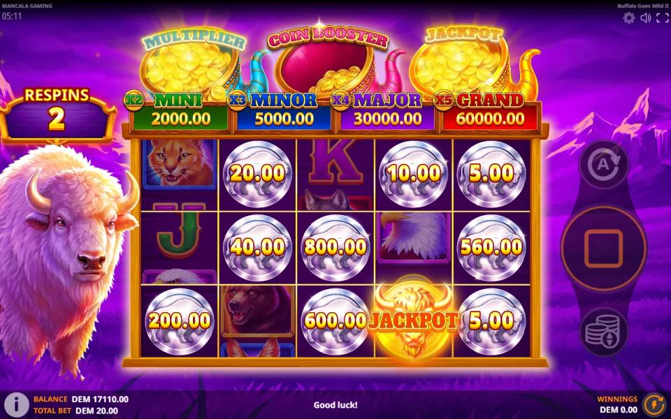 Buffalo Goes Wild II respins round with buffalo coins held across the 5x3 reels, a single Jackpot symbol on reel 4 and the Multiplier and Jackpot pots glowing above