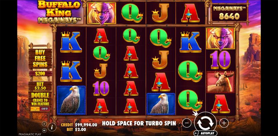 A Buffalo King Megaways board with aces stacked down reels three and four, the ways counter reading 8,640, and no winning combination