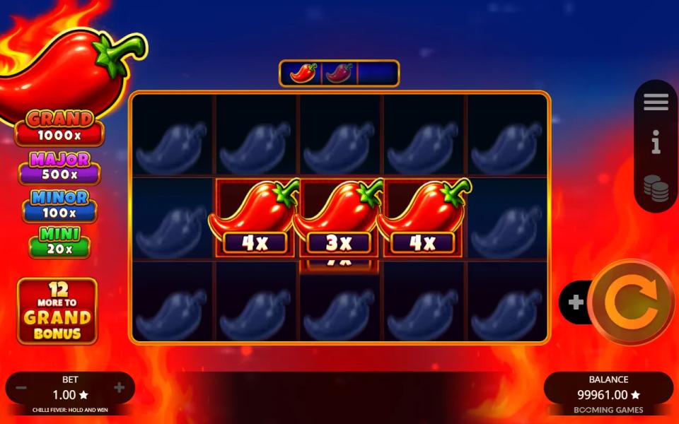 Hold and Win on the expanded 5x3 grid with three chillies held in the middle column and the other cells dark