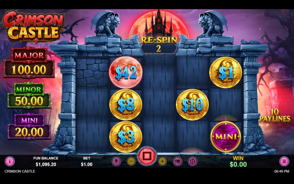 Crimson Castle Hold and Spin with the Moon showing 42 after collecting four coins and the Mini jackpot, which stay locked on the board
