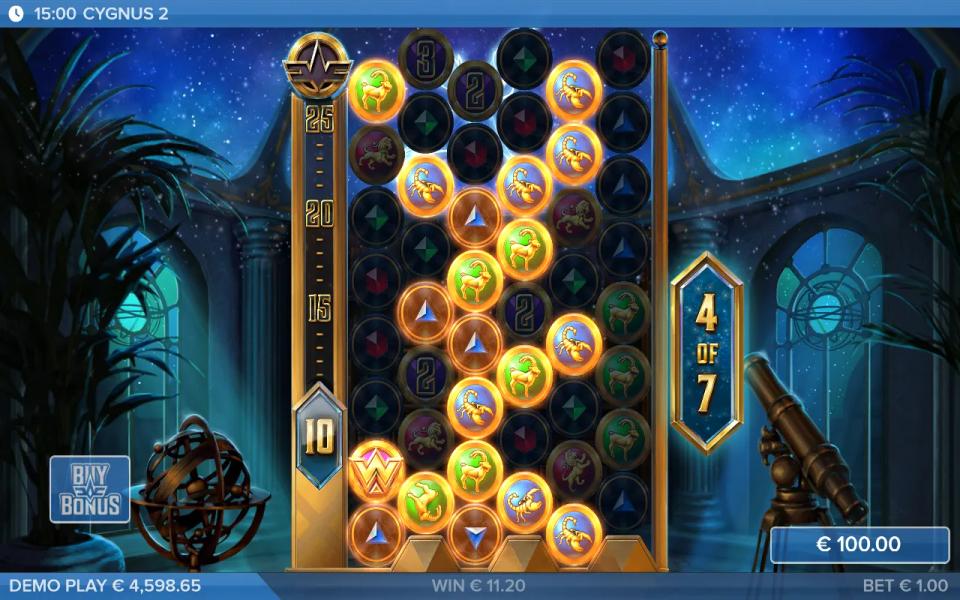 Cygnus 2 free drop on a board grown to eight rows, zodiac and gem symbols lit up in wins and the multiplier meter on the left reading 10