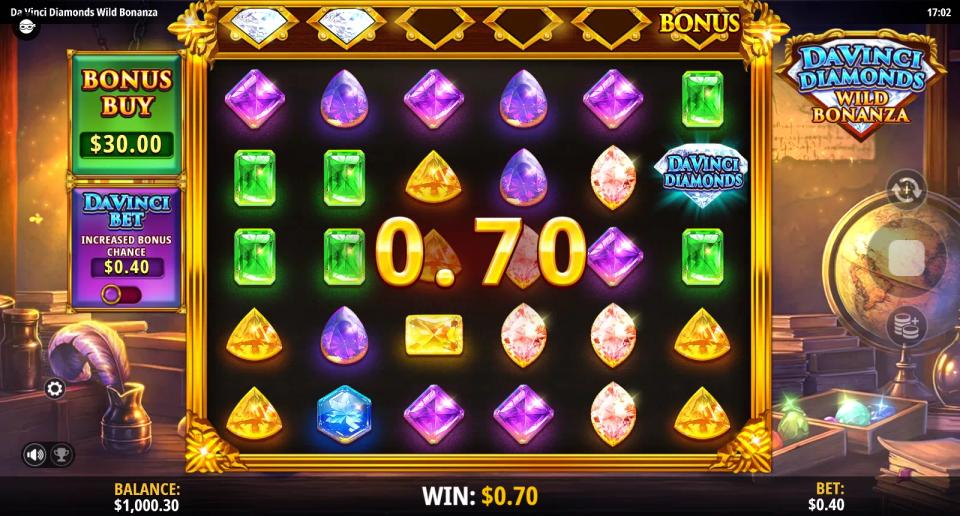 Da Vinci Diamonds Wild Bonanza 6x5 grid of coloured gemstones paying 0.70 on a scatter-pays win, with one Da Vinci Diamond scatter on the sixth reel