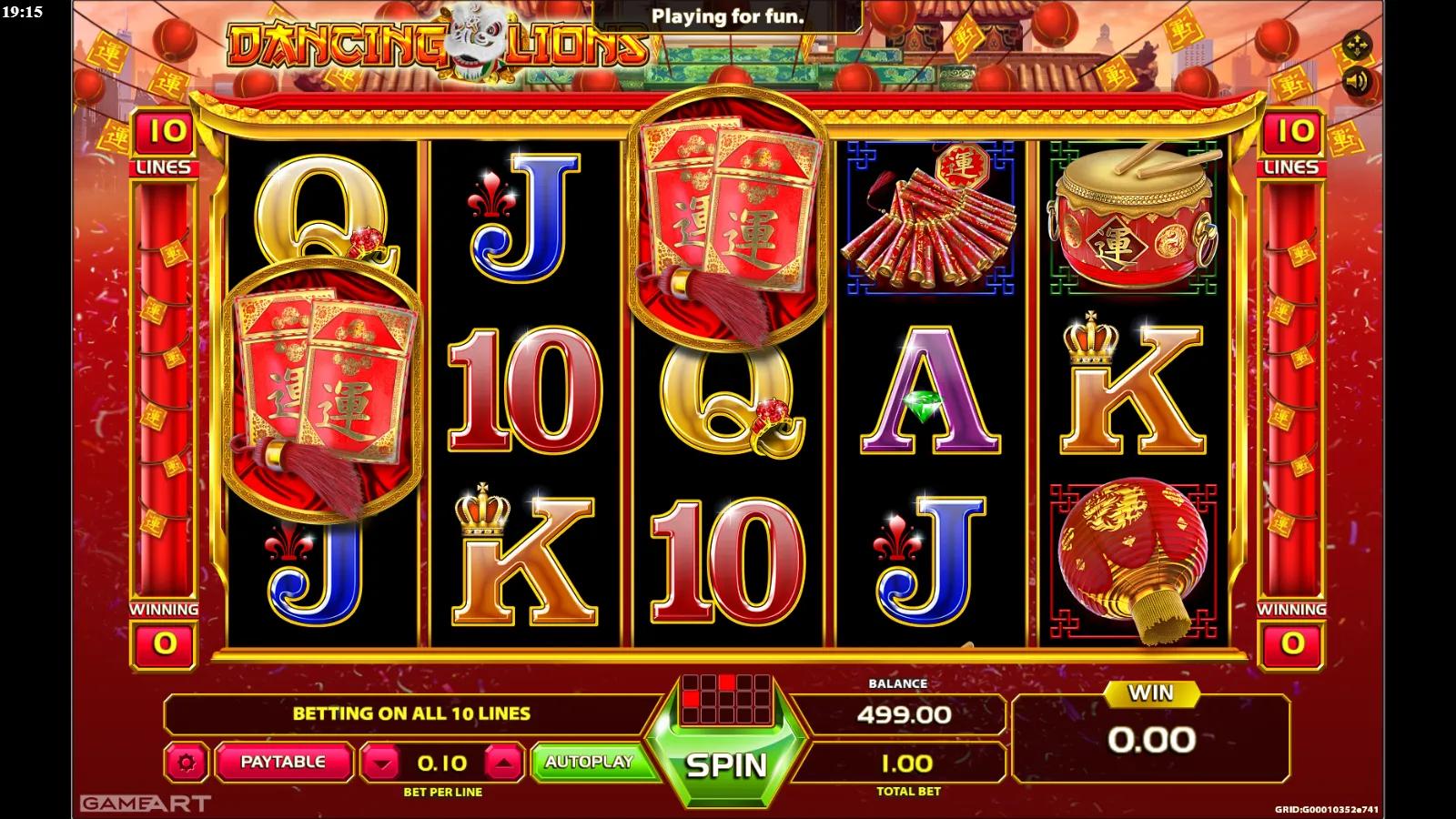 Dancing Lions slot gameplay showing the 5x3 grid with a dancing lion, drum, fan and red lantern symbols