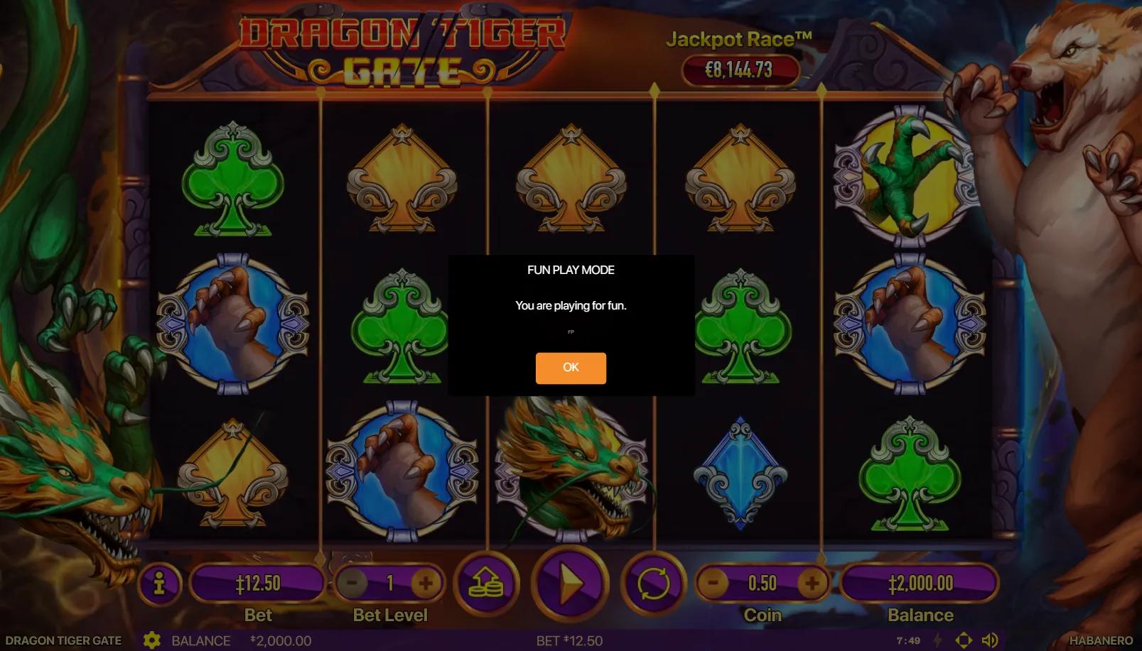 Dragon Tiger Gate slot gameplay showing 5x3 grid with green dragon and tiger guardians flanking ornate spade and claw symbols beside a Jackpot Race meter