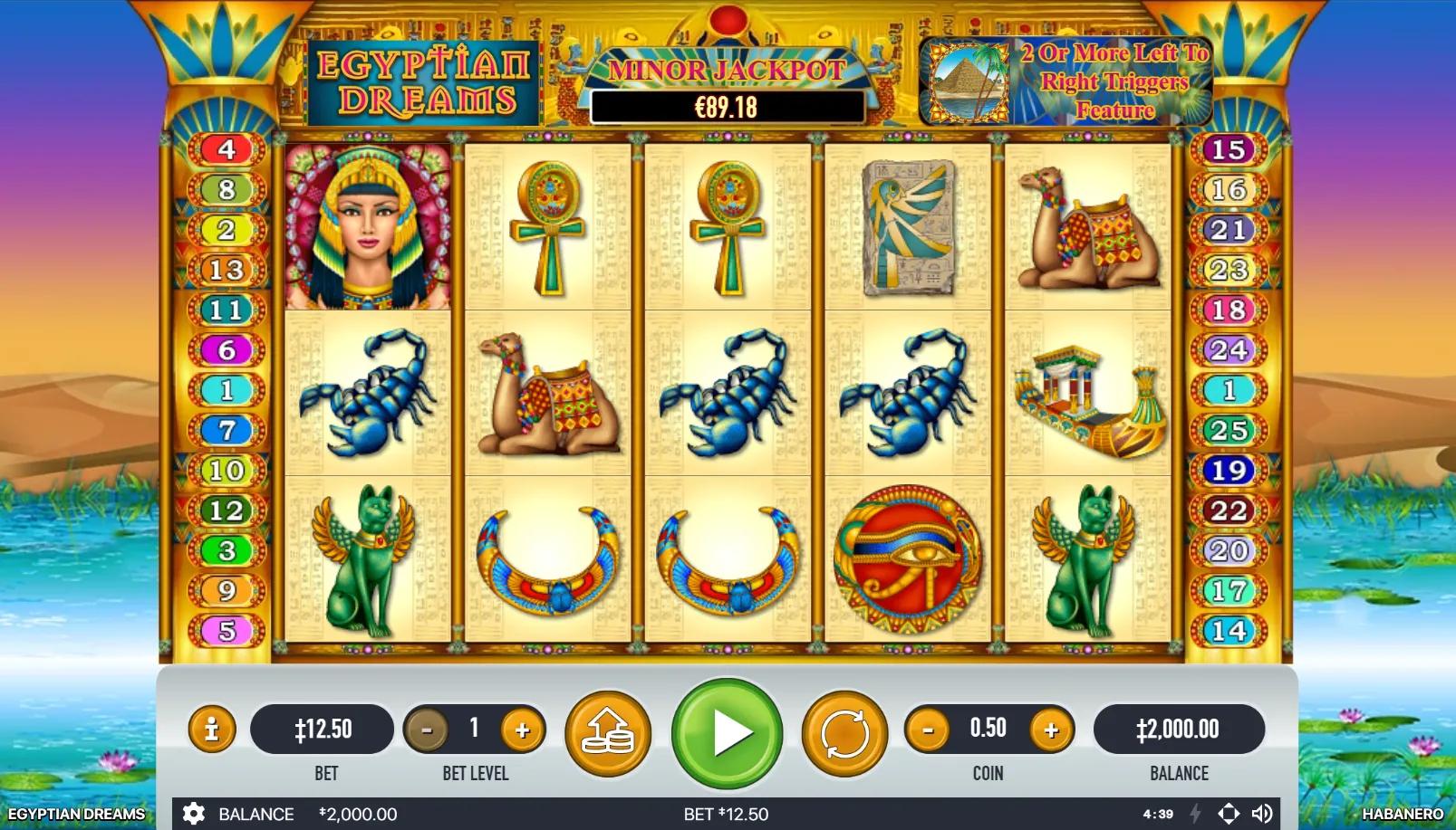 Egyptian Dreams 5x3 grid with Cleopatra, blue scorpion, jade Anubis and numbered payline rails on Nile backdrop