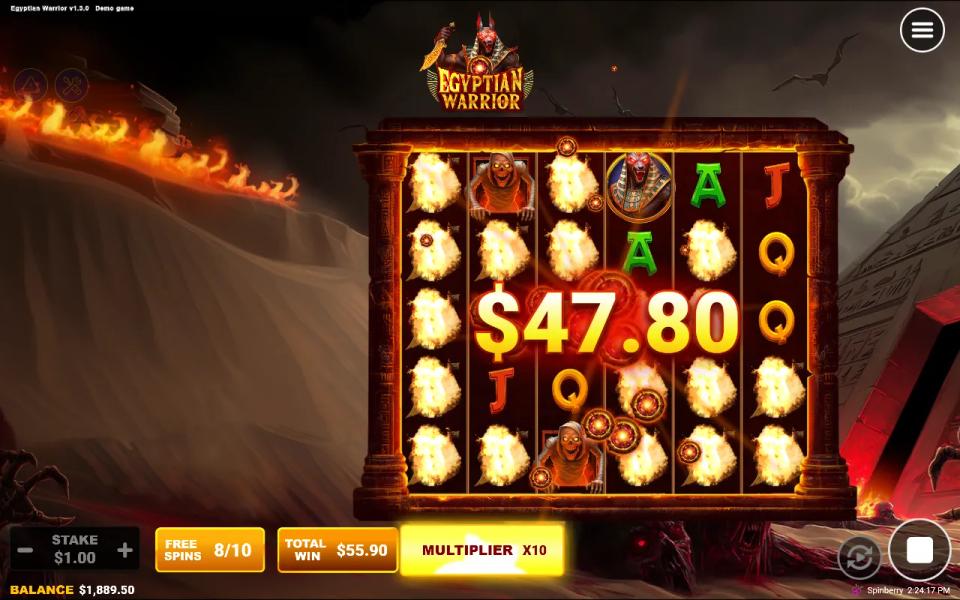 Late in a long cascade chain during Egyptian Warrior free spins, most of the grid exploding and the multiplier panel showing x10