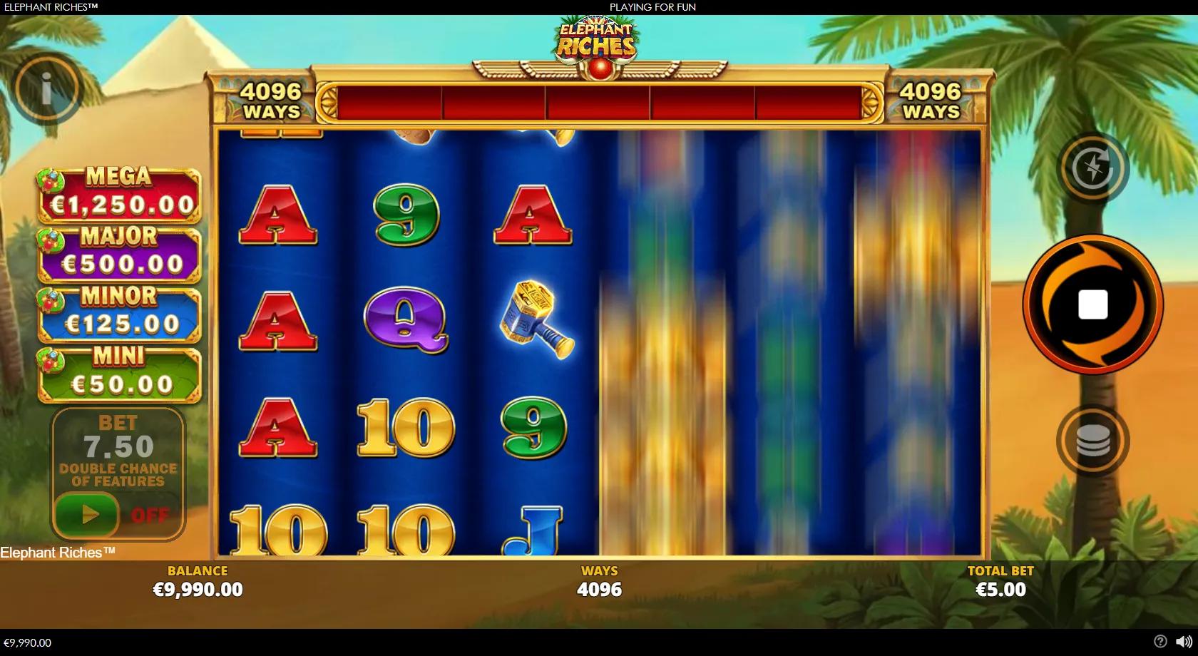 Elephant Riches gameplay showing the six-reel grid with a golden armoured elephant, Anubis sarcophagus, diamond and scarab symbols against a desert pyramid backdrop