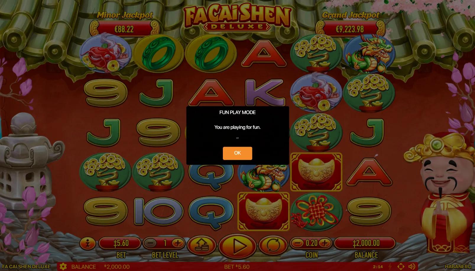 Fa Cai Shen Deluxe slot gameplay showing 6x5 cluster grid with golden coins, lanterns, royals and Minor + Grand Jackpot meters on imperial Chinese backdrop