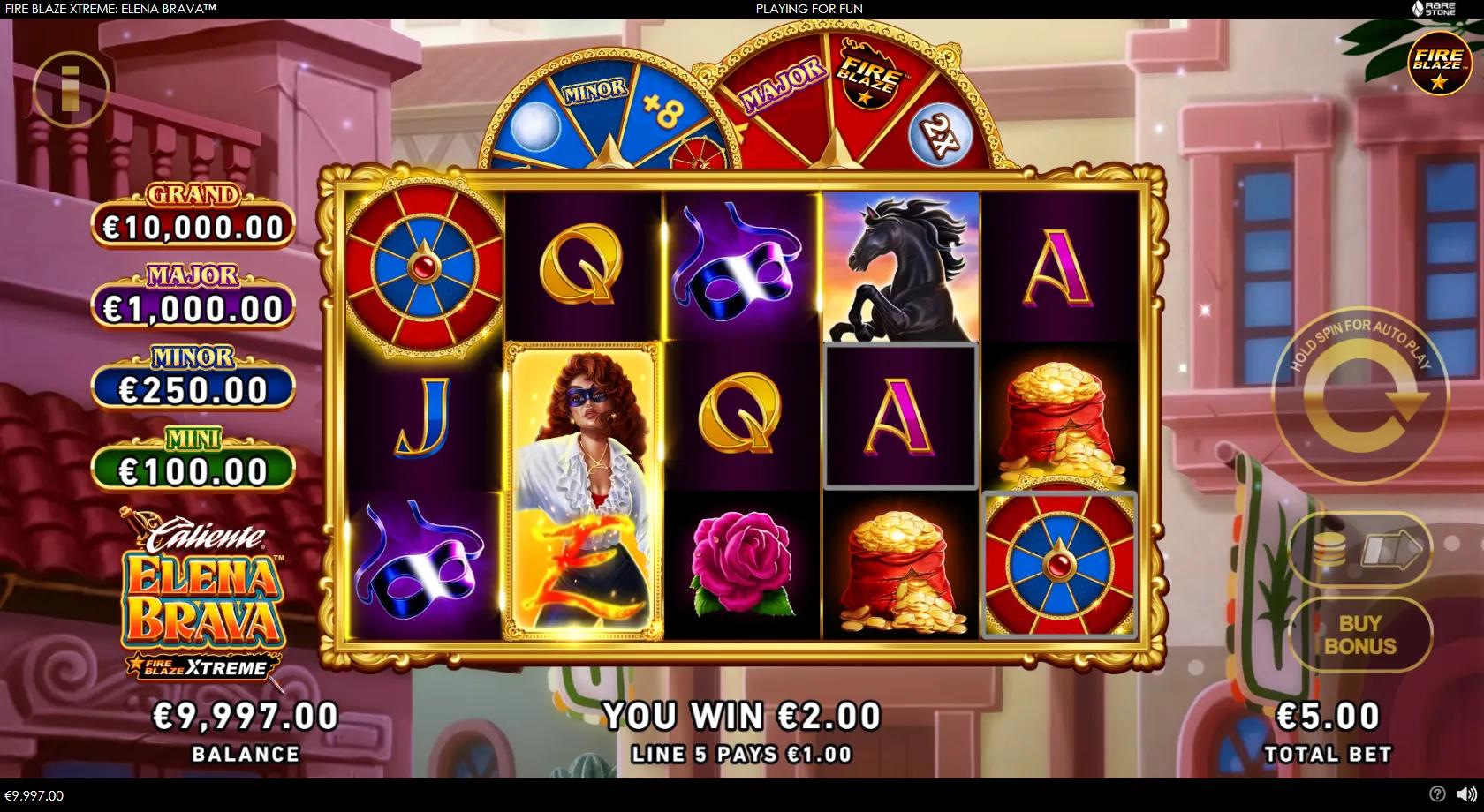 Fire Blaze Xtreme Elena Brava slot gameplay showing a 5x3 Spanish-colonial grid with a masked heroine, black horse, money bag and rose symbols, blue Fire Blaze moon coins and jackpot wheels