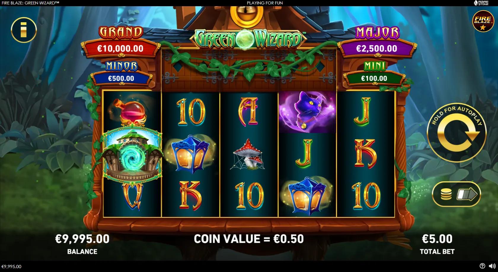Fire Blaze Green Wizard gameplay showing 5x3 forest-cottage reels with cat, potion and lantern symbols and four jackpots