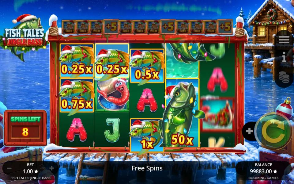 A 50x Christmas Bass standing three cells tall on reel 4 in the free spins, with small cash Fish on the reels beside it