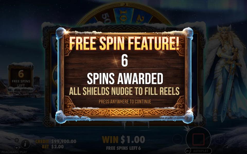 Award card reading Free Spin Feature, 6 spins awarded, all shields nudge to fill reels