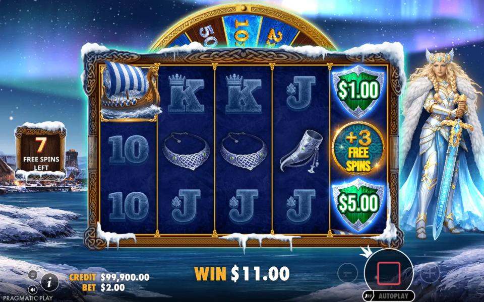 Free spin with the fifth reel holding a one dollar shield, a plus three free spins token and a five dollar shield, counter at seven