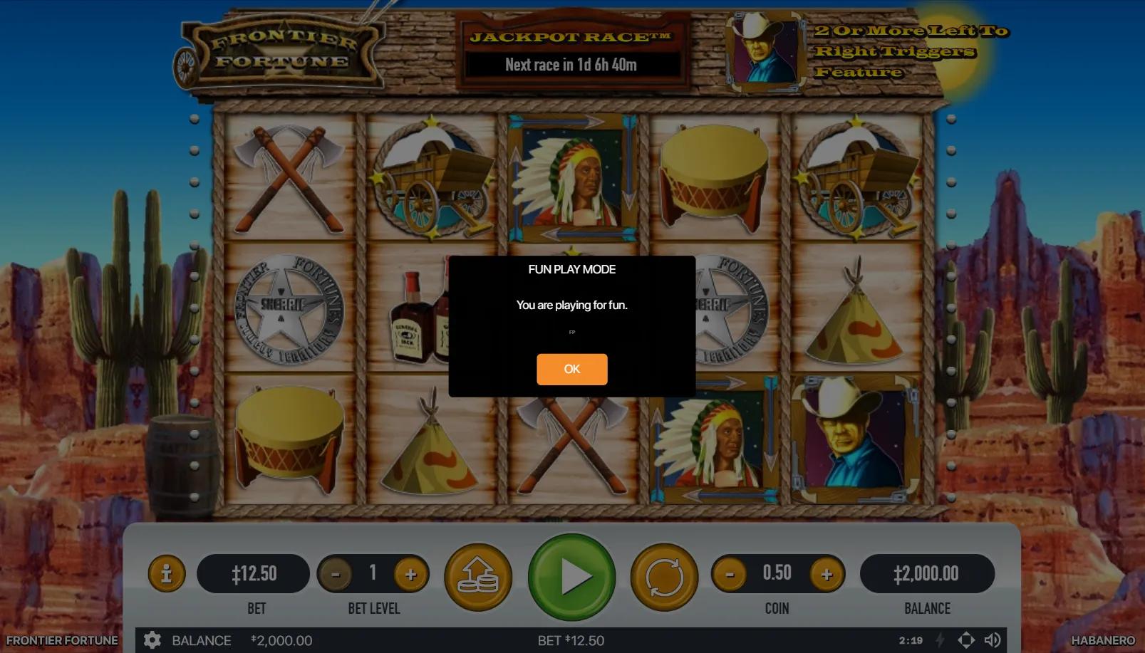 Frontier Fortunes slot gameplay showing 5x3 grid with Indian Chief, Sheriff, Cowboy bonus, guaranteed Wild, and Wild West gold rush symbols on dusty frontier town backdrop