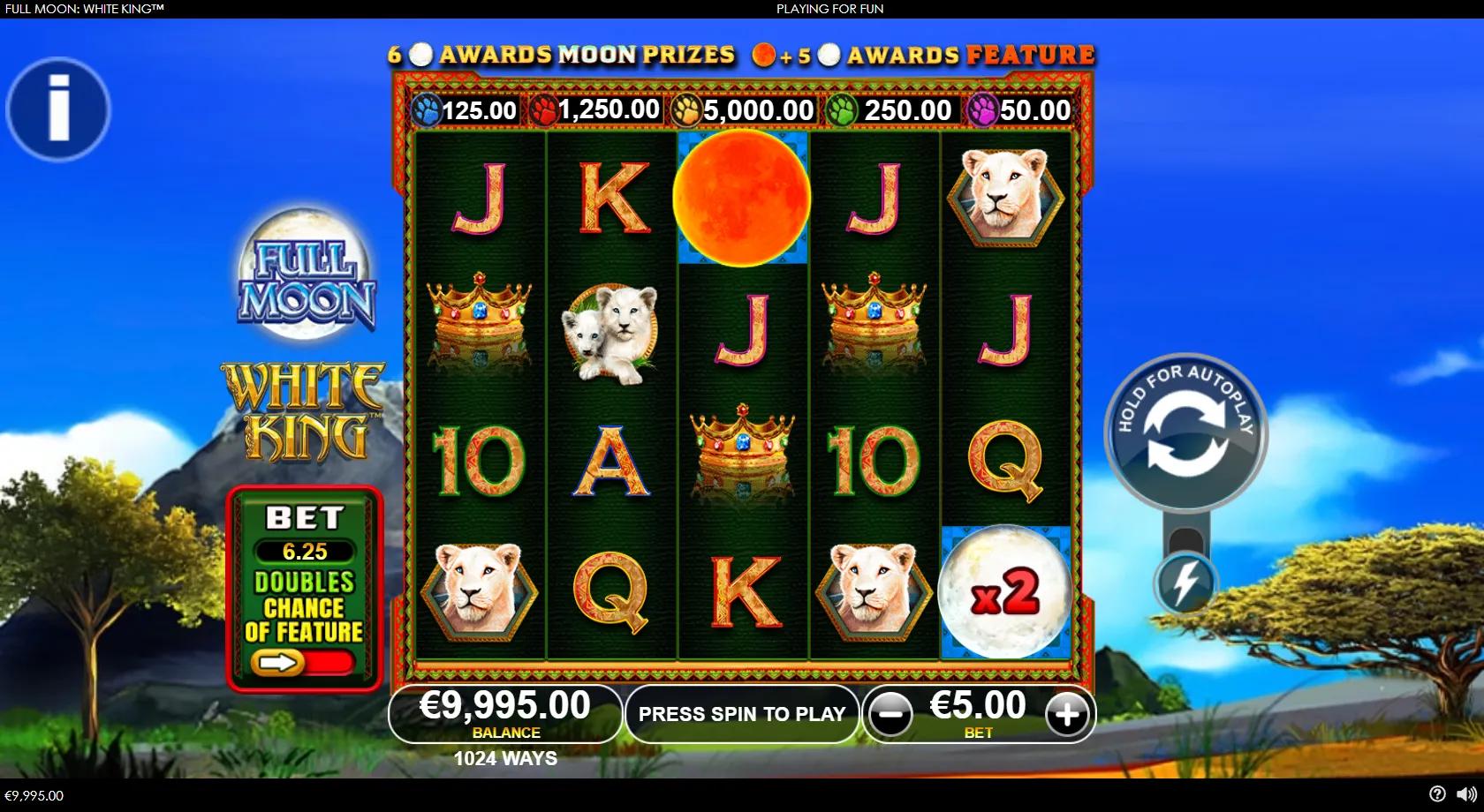 Full Moon White King slot gameplay showing a 5x4 African savanna grid with a white lion, lioness, cubs and crown symbols and moon prize symbols under a full moon