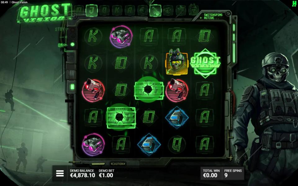 Ghost Vision respin with the J and the Grenade lit in the Display above the reels, two cells breaking into Wilds and a fresh Ghost Vision symbol on the fifth reel