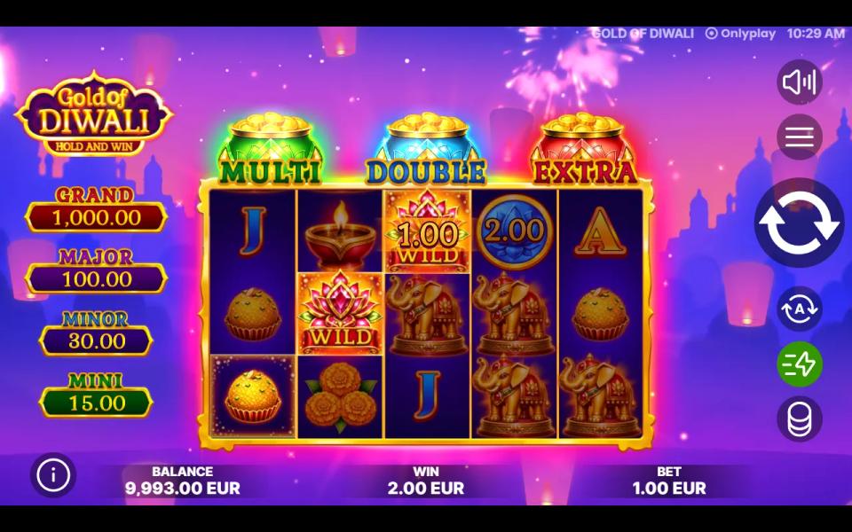 Gold of Diwali Hold and Win base game on a 5x3 board, lotus wilds, golden elephants and a blue coin among the symbols, with the Multi, Double and Extra pots above the reels