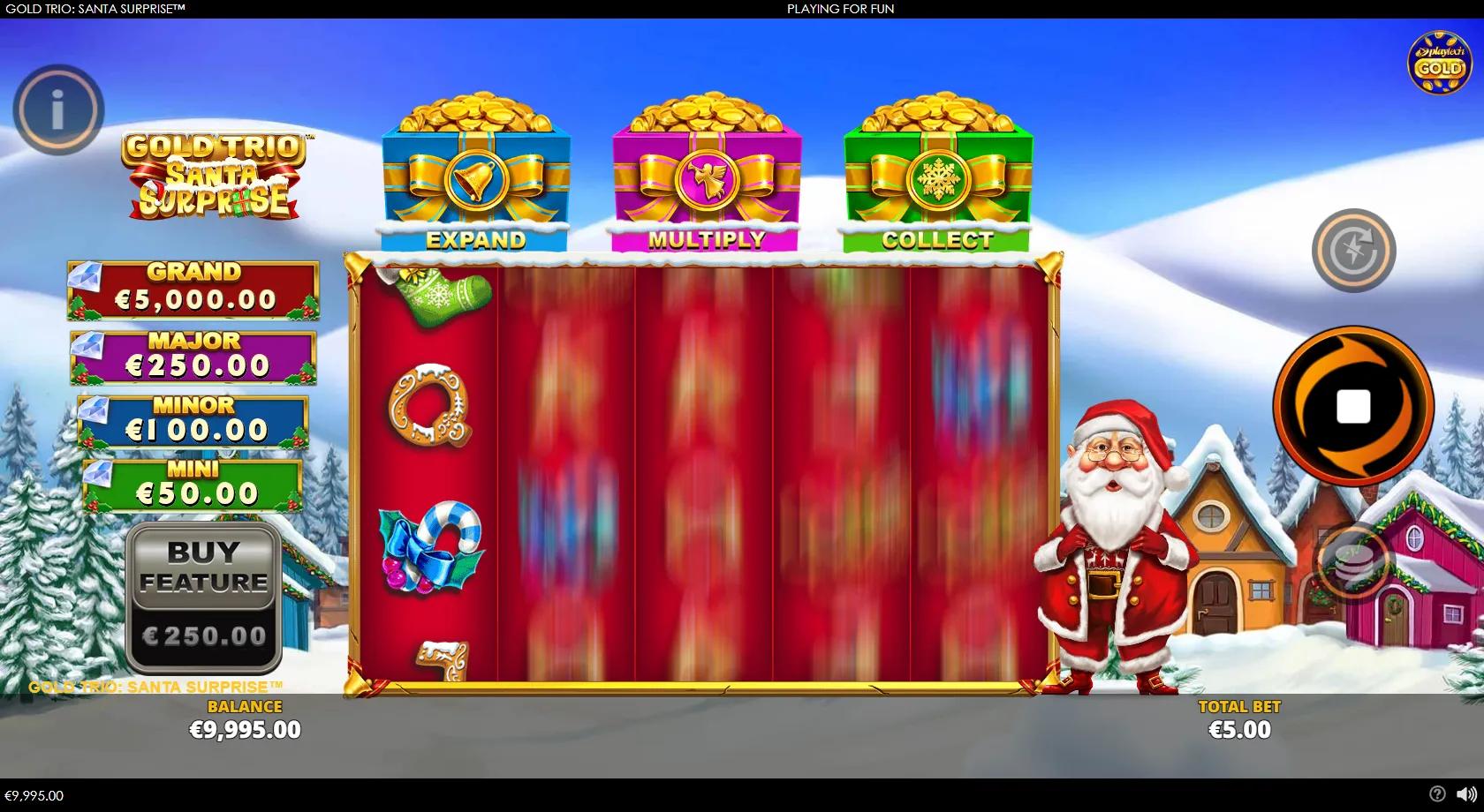Gold Trio Santa Surprise slot: 5x3 Christmas grid with gold coins, gift boxes and Expand/Multiply/Collect gifts