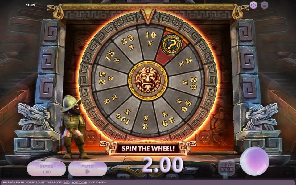 The Wheel Bonus in Gonzo's Quest Tap-a-Roo at its 12-sector level, prizes from 2x to 100x around a Mystery sector