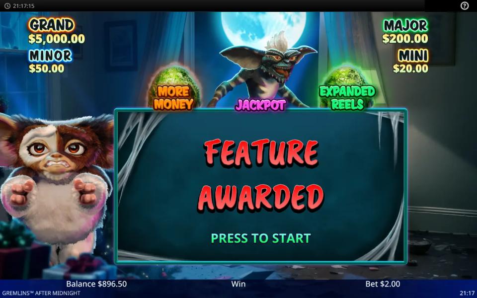 Gremlins After Midnight feature award screen with a Gremlin hatched behind the Jackpot egg