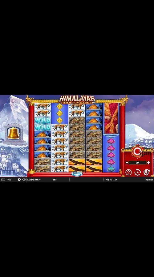 Himalayas Roof of the World gameplay: tall 5-reel 100-line grid with stacked WILD symbols plus tiger and tent symbols.