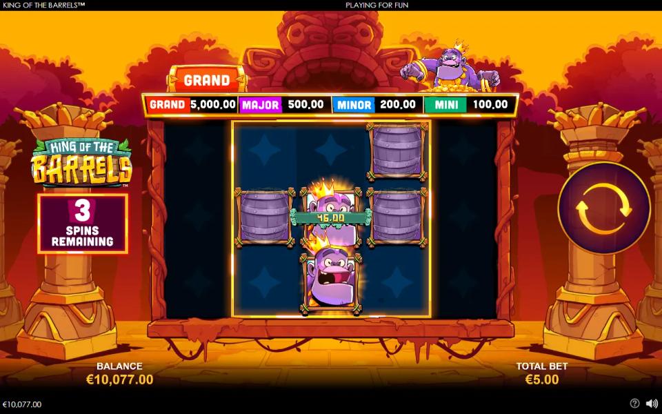 King of the Barrels free games running on the 3x3 board, two sticky gorillas on the centre reel with wooden barrels either side