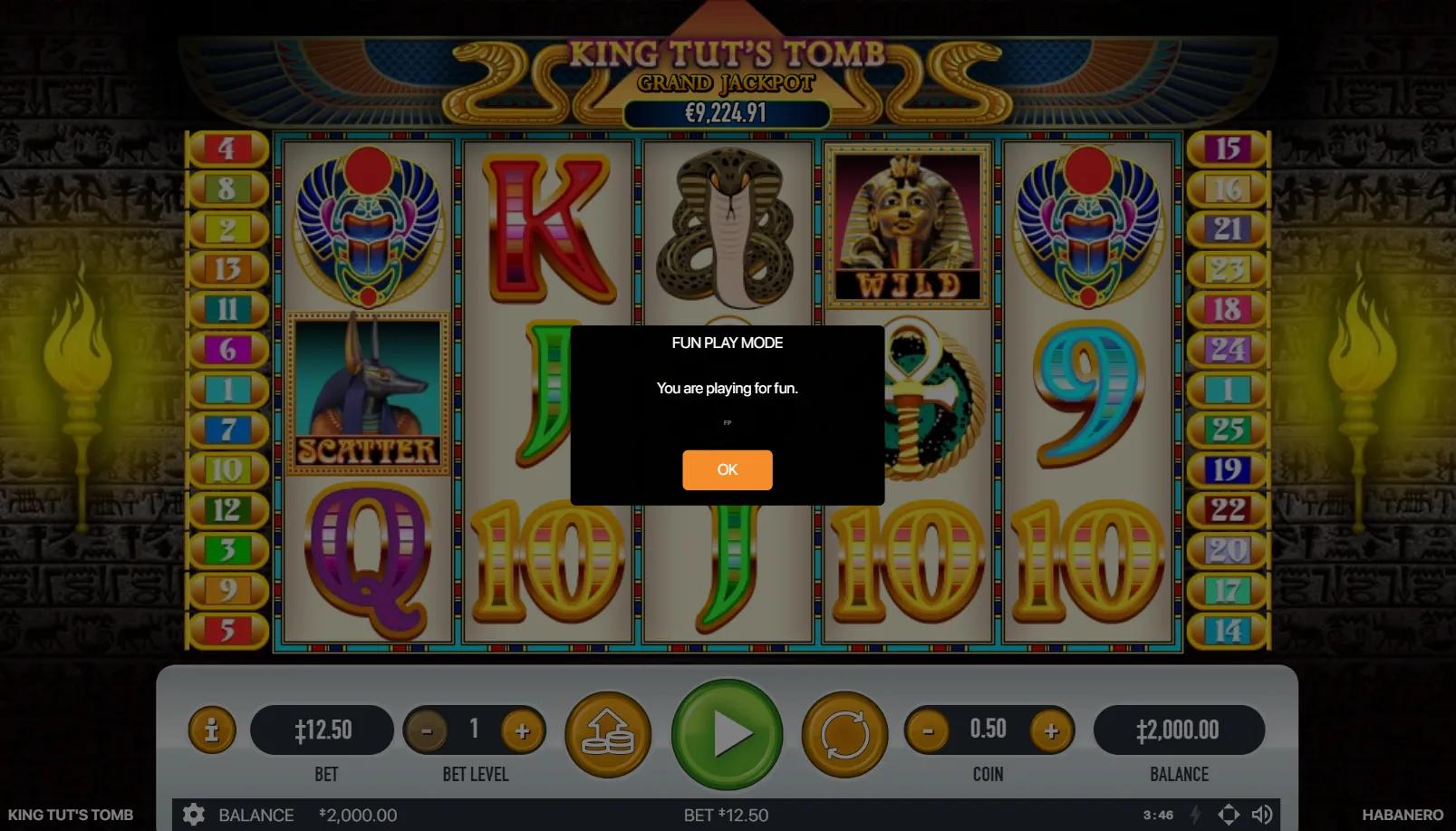 King Tut's Tomb slot gameplay showing 5x3 grid with King Tut gold mask Wild, Anubis Scatter, winged scarab and cobra symbols