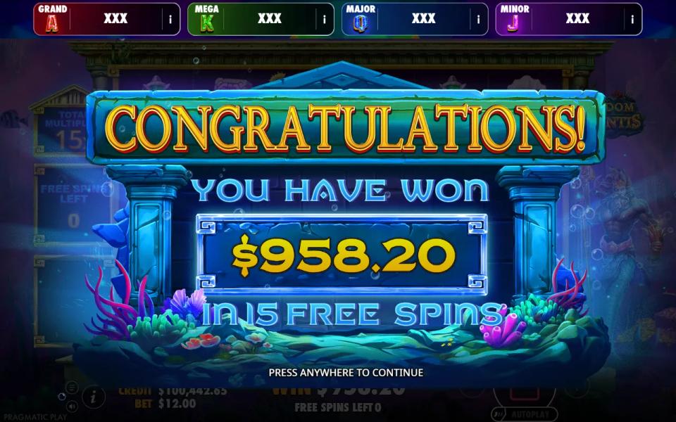 Kingdom of Atlantis end-of-round card reading that 958.20 was won across 15 free spins, with the four jackpot tiers above it still reading XXX