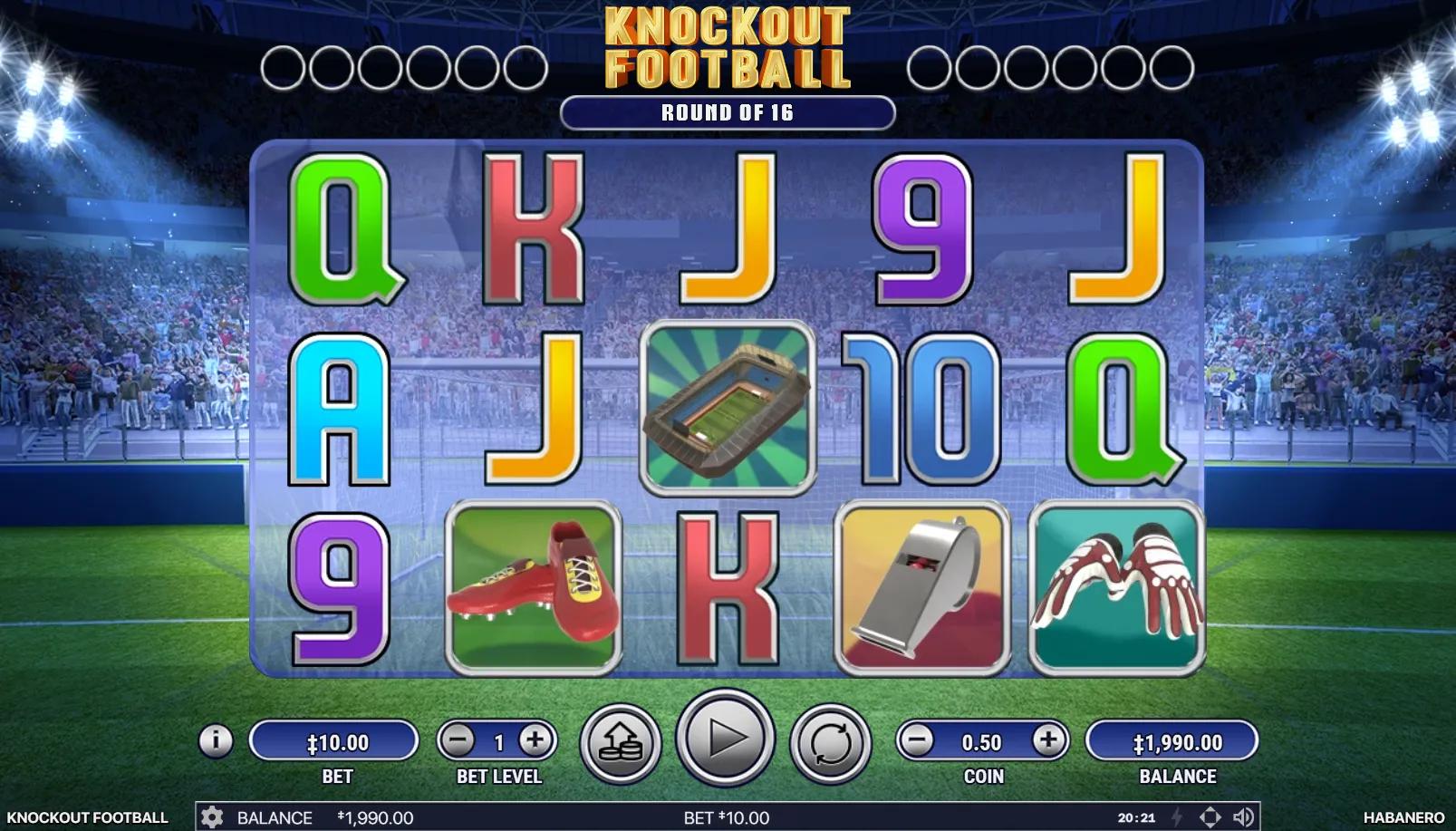 Knockout Football slot gameplay showing 5x3 grid with red soccer cleat, soccer ball wild, trophy scatter, stadium top symbol, and colorful card royals on football stadium pitch backdrop