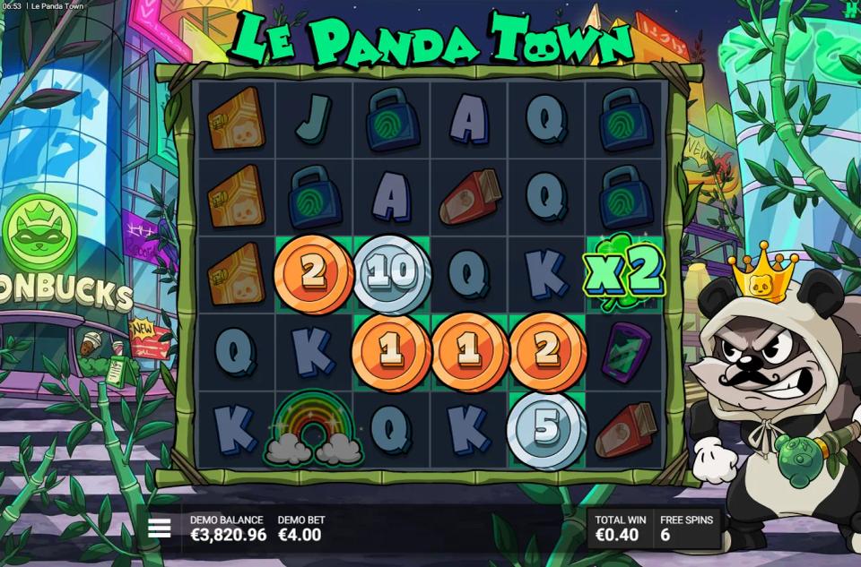 Coins revealed beside a four-leaf clover carrying a x2 multiplier in the All That Glitters Is Gold bonus of Le Panda Town