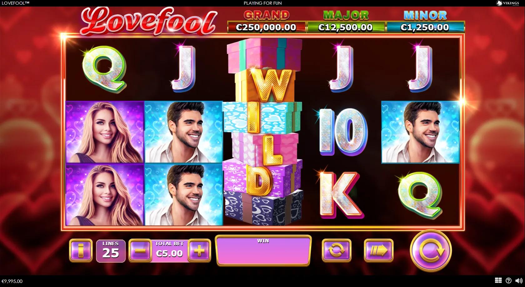 Lovefool 5x3 Valentine grid with the young cast, an expanding gift-box wild and heart coins beside three jackpot meters