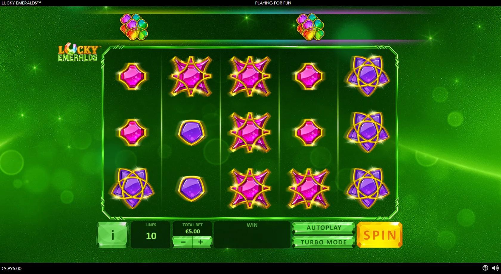 Lucky Emeralds 5x3 green gem grid with an emerald, gold horseshoe, blue and pink jewels and rainbow four-leaf-clover wilds
