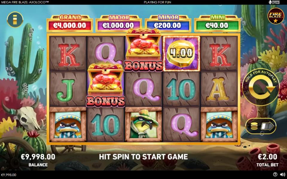 Mega Fire Blaze Axoloco 5x3 grid showing two Bonus treasure chest scatters on reels two and three and one lit gold prize coin