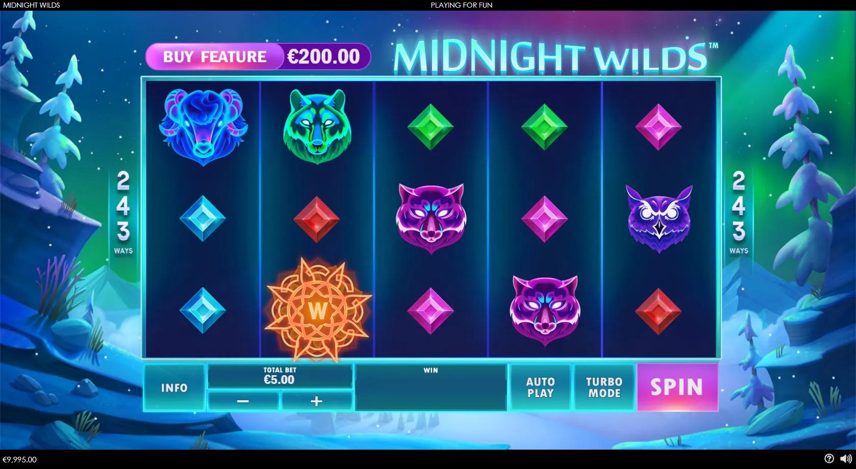 Midnight Wilds 5x3 243-ways aurora-night grid with neon spirit-animal symbols, an orange mandala wild and a moonflower scatter