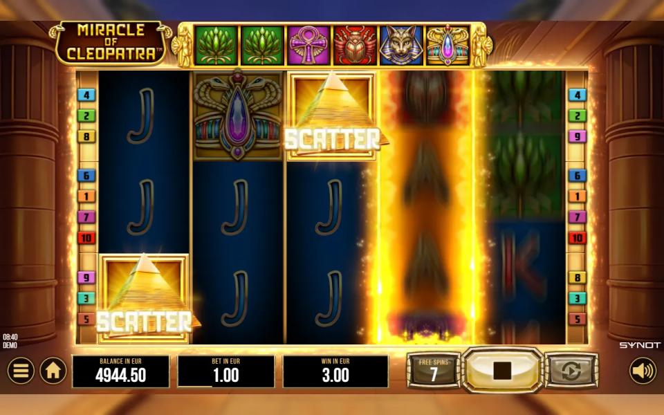The progress bar above the free-spin reels opening with two lotus flowers after the wands were upgraded, followed by ankh, scarab, cat and crown