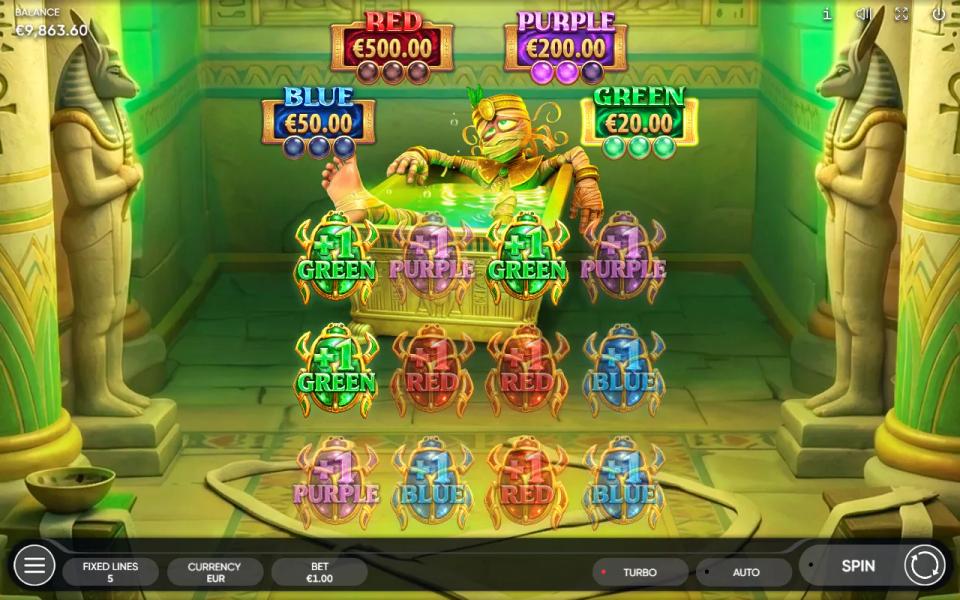 Mummy Pick'em field of twelve scarabs revealed, three green, three purple, three red and three blue, with the green award counter full