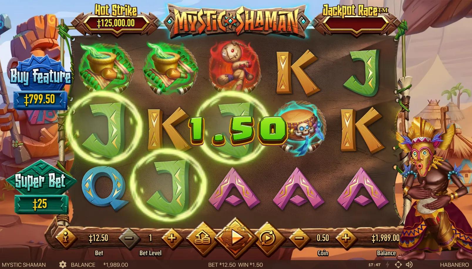 Mystic Shaman slot gameplay showing 5x3 grid with voodoo doll, bone skull drum and rune royals beside a masked shaman figure on savanna backdrop