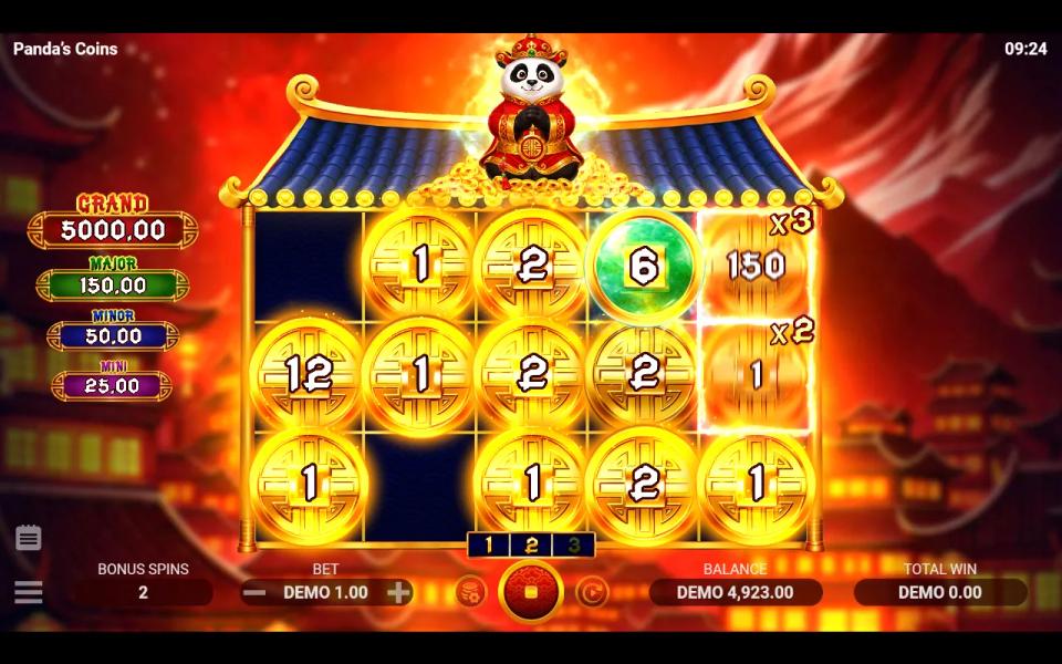 A Bonus Coin sitting in the reel 1 multiplier cell now reading 12, with x3 and x2 cells marked on reel 5
