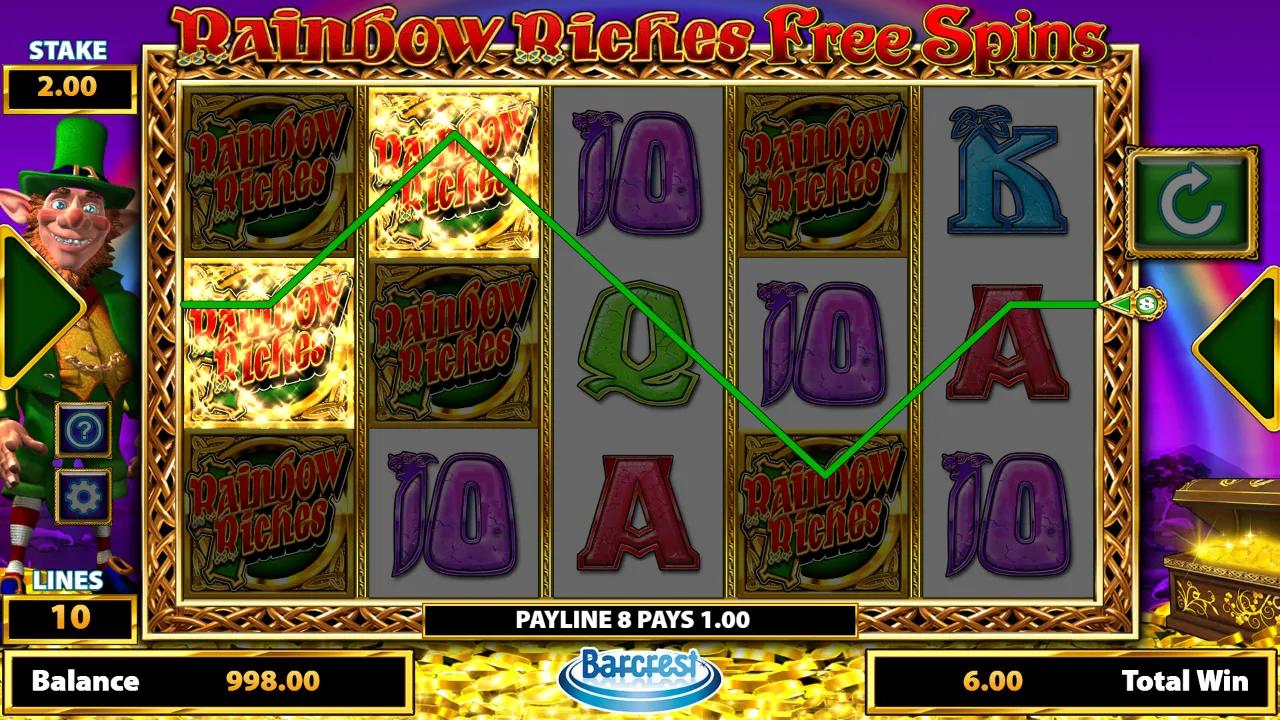 Rainbow Riches Free Spins slot gameplay showing 5x3 grid with stacked Rainbow Riches Wild logos on a payline win