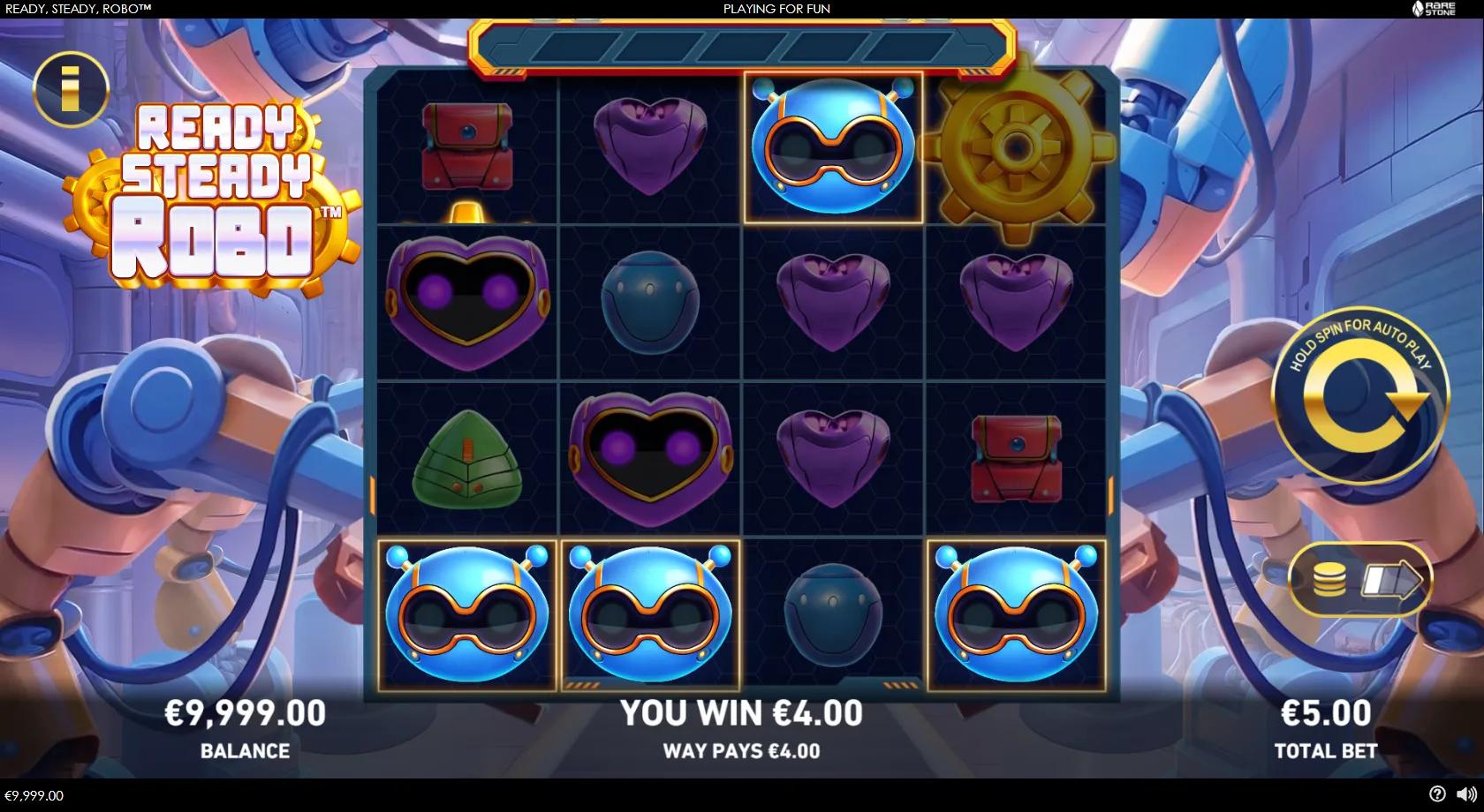 Ready Steady Robo slot gameplay showing 4x4 robot-factory grid with colourful robot symbols, a Wild battery and gold gear scatter