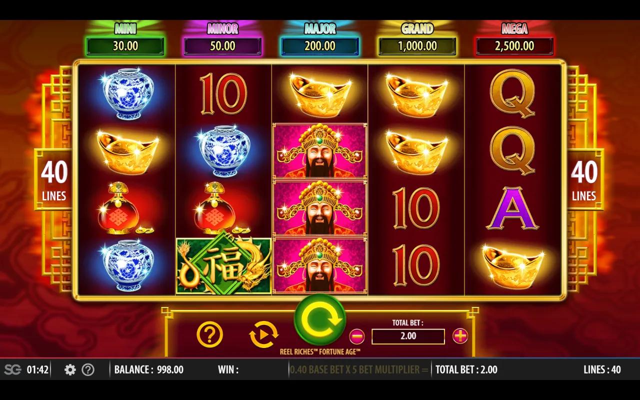 Reel Riches Fortune Age gameplay: 5x4 grid over crimson lacquer with five jackpot meters arching across the top.