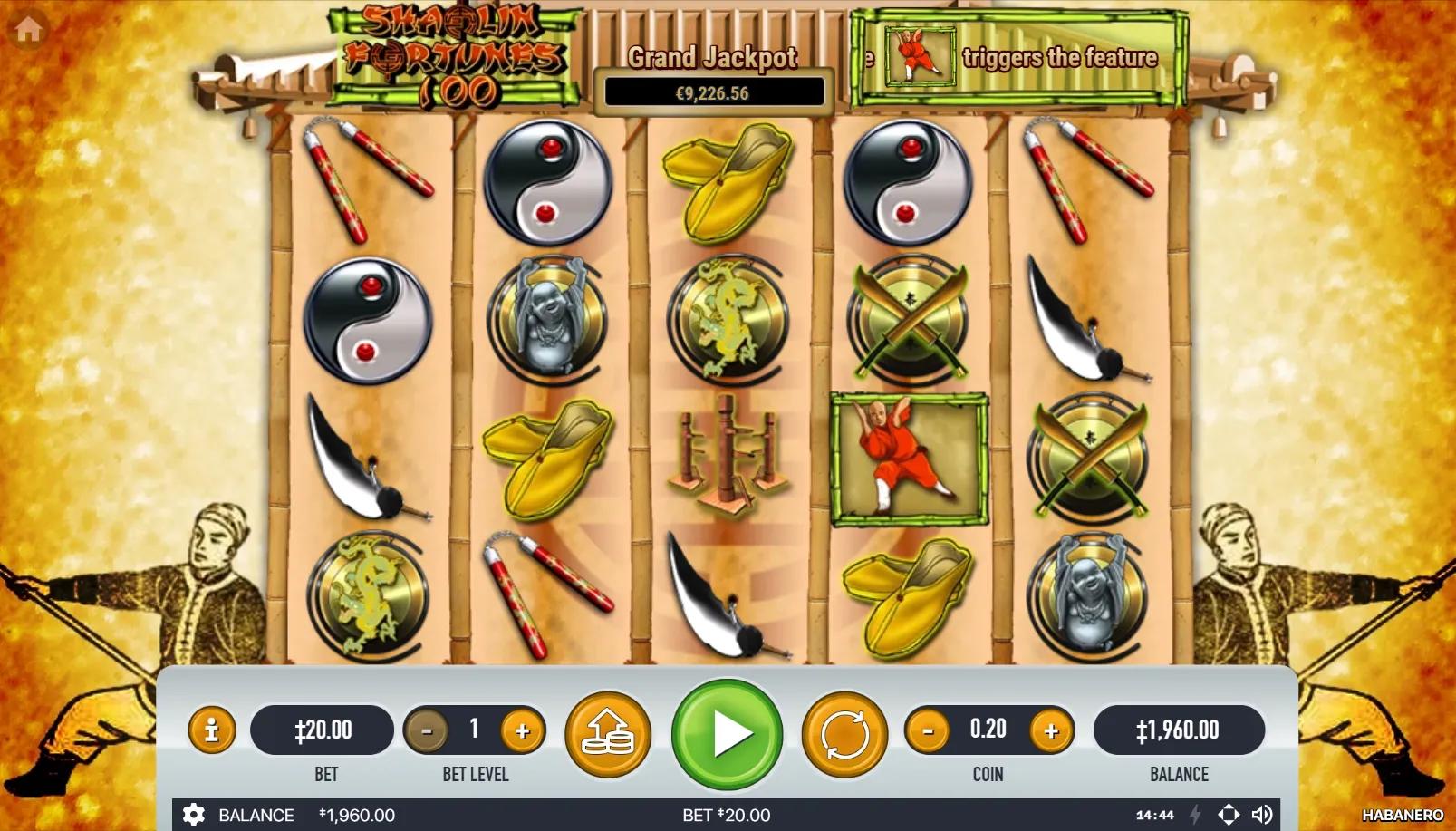 Shaolin Fortunes 100 slot showing 5x4 grid bamboo cabinet with pagoda, YinYang, nunchaku, Buddha, and Shaolin warriors flanking