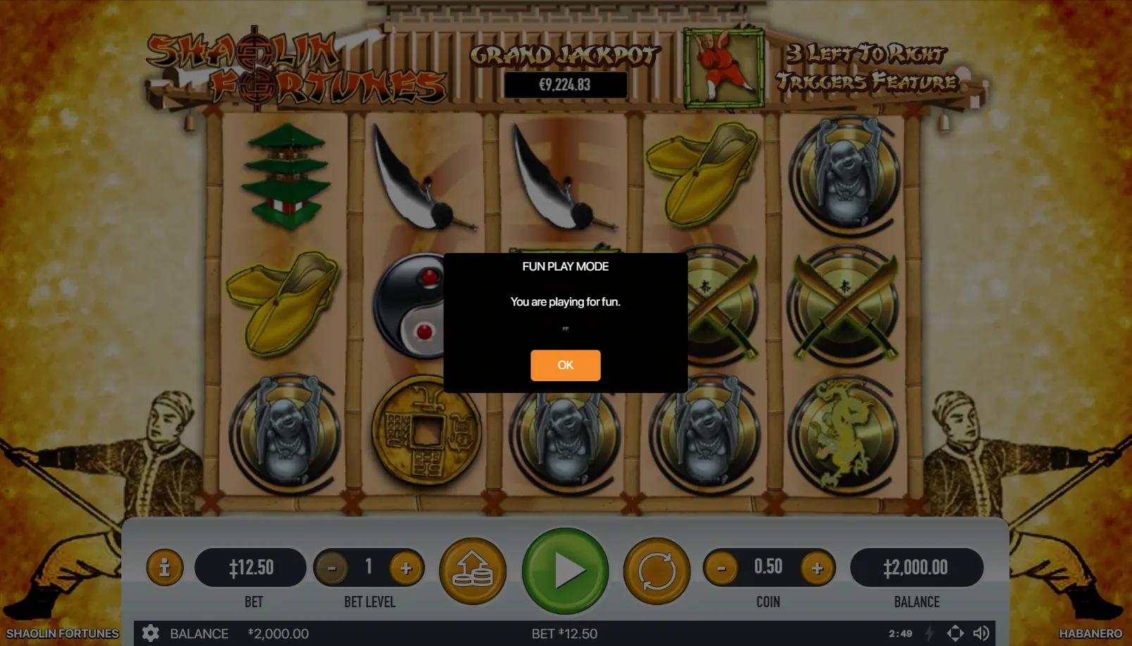 Shaolin Fortunes gameplay showing 5x3 grid with monk, dragon, yin yang, pagoda and kung-fu shoes on bamboo temple backdrop